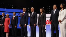From left, Sen. Michael Bennet, D-Colo., Sen. Kirsten Gillibrand, D-N.Y., former HUD Secretary Julian Castro, Sen. Cory Booker, D-N.J., former Vice President Joe Biden, Sen. Kamala Harris, D-Calif., Andrew Yang and Rep. Tulsi Gabbard, D-Hawaii, are introduced before the second of two Democratic presidential primary debates hosted by CNN Wednesday, July 31, 2019, in the Fox Theatre in Detroit. (Carlos Osorio/AP)