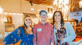 Academy Head of School Beth Spear, left, with recent graduate Kason Kolka and Speech Language Pathologist Assistant Alie Wallace