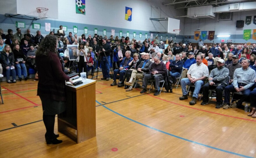 Assistant DEQ Secretary Sheila Holman welcomed the crowd at Thursday's hearing on coal ash at Marshall Steam Station. 