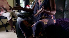 Emmanuel and Rose, both of whom WGCU is protecting identities for, sit in Rose's living room explaining how the elimination of Haitian TPS is impacting their lives.