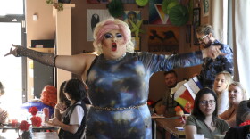 This July 28, 2022, photo shows drag queen Dela Rosa performing in a mock election at Cafecito Bonito in Anchorage, Alaska, where people ranked the performances by drag performers. Several organizations are using different methods to teach Alaskans about ranked choice voting, which will be used in the upcoming special U.S. House election.