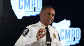 Charlotte-Mecklenburg Police Chief Johnny Jennings speaks during a news conference Wednesday, Nov. 15, 2023, in Charlotte, N.C. A video circulating on social media shows a North Carolina police officer striking a woman repeatedly during an arrest while several other officers hold her down, but police officials said the officer was “intentional” about where he hit the woman to get her to stop resisting and comply. (AP Photo/Erik Verduzco)