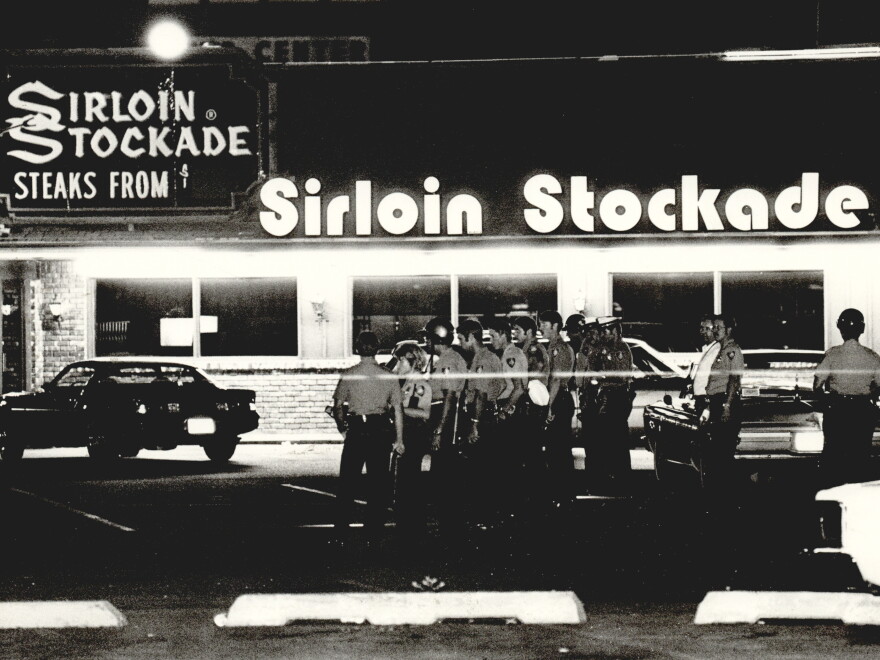 Police descend on the Sirloin Stockade, 1620 SW 74, after discovery of slain employees on July 16, 1978.