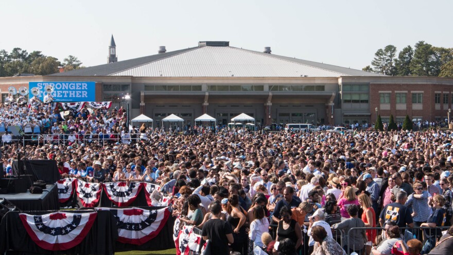 Thousands of Hillary Clinton supporters wait to hear from President Barack Obama in Chapel Hill