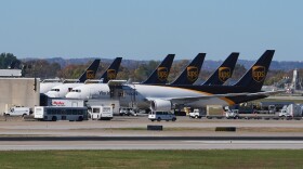 UPS jets are parked at the Worldport package sorting complex at Louisville Muhammad Ali International Airport, Thursday, Nov. 6, 2025, in Louisville, Ky. (AP Photo/Darron Cummings)