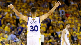 Stephen Curry of the Golden State Warriors celebrates against the Cleveland Cavaliers during the second quarter in Game 5 of the 2016 NBA Finals at ORACLE Arena on June 13, 2016 in Oakland, California. (Ezra Shaw/Getty Images)