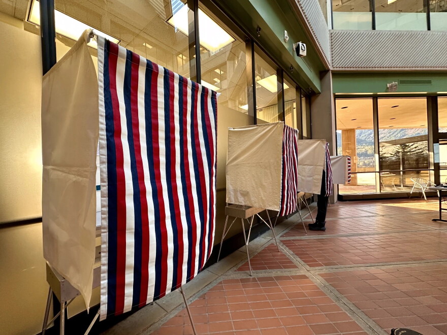 A voter casts an early vote in Juneau at the State Office Building on Oct. 26, 2026.