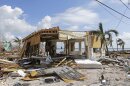 Debris surrounds a destroyed structure in the aftermath of Hurricane Irma 