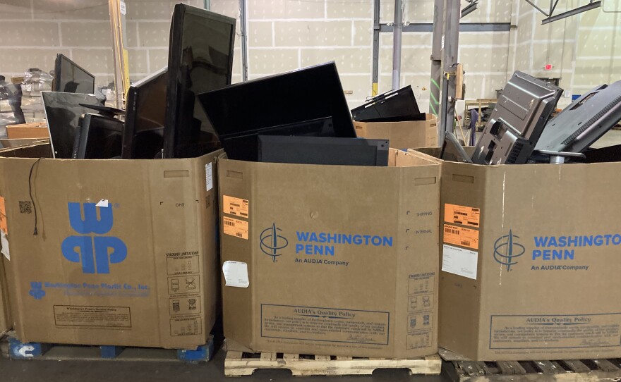 Televisions awaiting teardown at eLoop