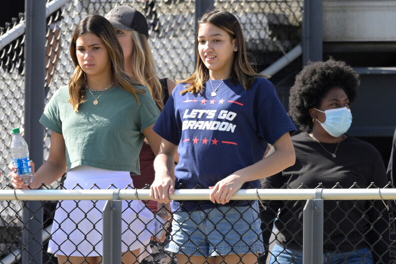 FILE - A spectator wears a Let's Go Brandon shirt in the stands during the first half of the Hula Bowl NCAA college football game, Jan. 15, 2022, in Orlando, Fla. (AP Photo/Phelan M. Ebenhack, File)