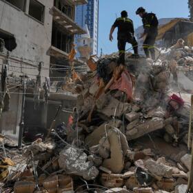 Lebanese civil defense workers inspect the rubble at the site of a building destroyed in an Israeli airstrike a day earlier in Beirut, Lebanon, Thursday, April 9, 2026. (Hussein Malla/AP)