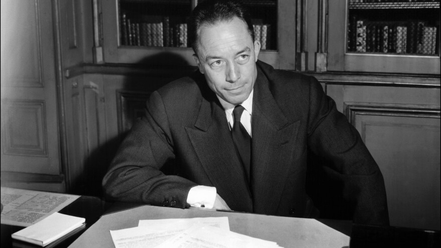 Algeria-born Albert Camus poses for a portrait in Paris following the announcement that he is being awarded the Nobel Prize for literature in 1957. Camus' views on his birthplace still stoke controversy.