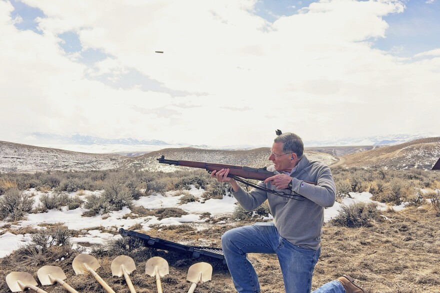 "It was the same gun my dad used during the Battle of the Bulge," Sen. John Barrasso (R-WY) recalled, referring to the M1 Garand. Above, Barrasso lines up a celebratory shot at the Wyoming State Shooting Complex's groundbreaking ceremony.