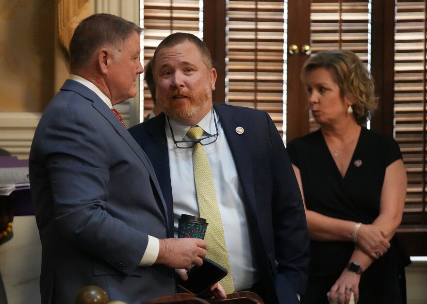 LCI Committee Chairman Bill Herbkersman, R-Beaufort, talks with Rep. Gary Brewer, R-Charleston, in the House chamber at the South Carolina Statehouse on March 25, 2026.