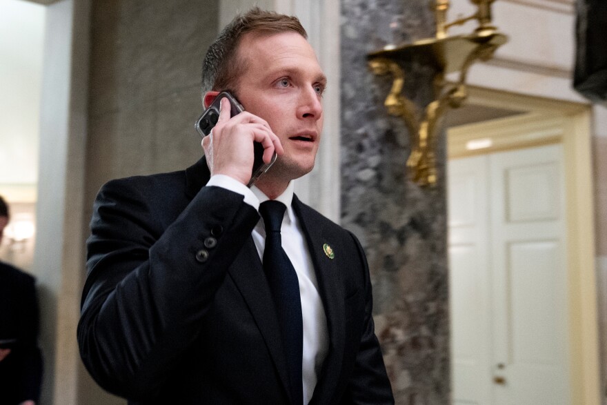 FILE - Rep. Max Miller, R-Ohio, walks out of a meeting with House Majority Leader Steve Scalise of La., on Capitol Hill, Oct. 11, 2023, in Washington.  