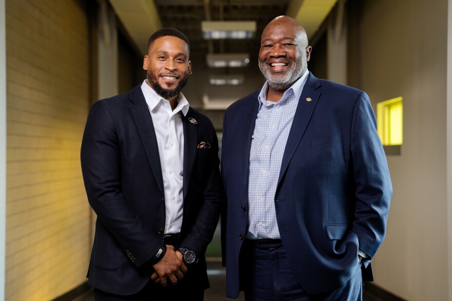 Boys and Girls Clubs of St. Louis President Brandon Williams alongside his predecessor Dr. Flint Fowler on Tuesday, Dec. 10, 2024, at the Boys & Girls Club of Greater St. Louis - Adams Park Club in north St. Louis.