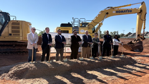 Representatives from the Oklahoma City Housing Authority and development company Elmington pose at a groundbreaking ceremony for West Haven Flats, a new workforce housing project in west Oklahoma City.