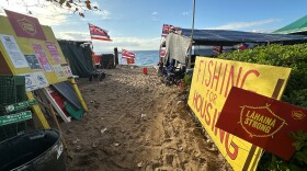 Housing was identified as a major challenge by community members immediately after the 2023 wildfires, which exacerbated an already-existing housing shortage on Maui. Pictured here, Lahaina Strong camped out on Ka'anapali Beach for months to raise awareness of the issue, seen here in January 2024. Many fire survivors, like Charles Nahale, continue to struggle to find housing options three years after the fire.