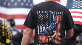 Members of the far-right group Proud Boys gather for a rally in an abandoned parking lot on the outskirts of Portland, Ore. , Sunday, Aug. 22, 2021. (AP Photo/Alex Milan Tracy)