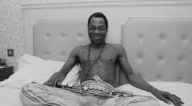 Nigerian multi-instrumentalist, musician, composer, and pioneer of the Afrobeat music genre Fela Kuti (1938 - 1997) in an hotel room, UK, 6th January 1984. (Photo by Mike Moore/Daily Express/Hulton Archive/Getty Images)