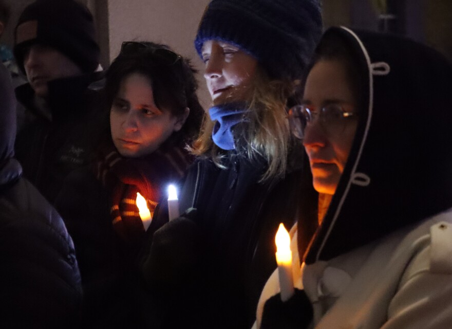 The evening grew steadily darker and colder as the vigil continued.