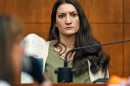 Lindsay Clancy waits for the judge to call a prospective jury member into court in her murder trial where she is charged in the 2023 killing of her three children, Wednesday, July 22, 2026, in Plymouth Superior Court in Plymouth, Mass. (Greg Derr/The Patriot Ledger via AP, Pool)