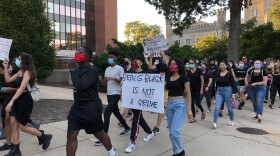 Students march on the Quad