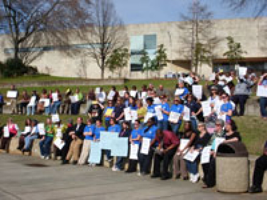 Some CMS teachers and support staff protest proposed teacher cuts. hspace=4
