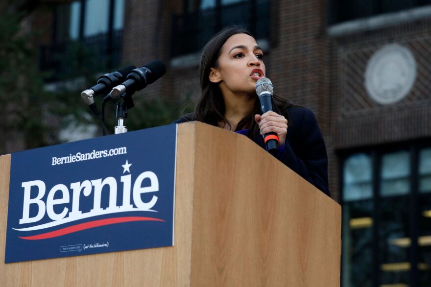 Rep. Alexandria Ocasio-Cortez, seen here speaking at a campaign event for Bernie Sanders in March, has been named co-chair of a climate change task force to support party unity.