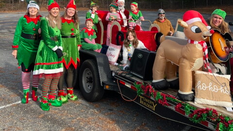 Buncombe County commissioners signed off on this year's version of the Fairview holiday parade at their meeting Tuesday. Shown here are Santa Claus and helpers from the 2025 parade.