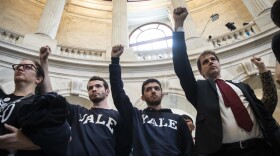 Protesters, including current Yale University law student Jesse Tripathi (second from right), rally against Supreme Court nominee Brett Kavanaugh in the rotunda of the Russell Senate Office Building on Capitol Hill, Sept. 24, 2018 in Washington, D.C. (Drew Angerer/Getty Images)