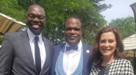 Kent County Commissioner Robert S. Womack (center) with Michigan Governor Gretchen Whitmer (right) and Lt. Governor Garlin Gilchrist (left).