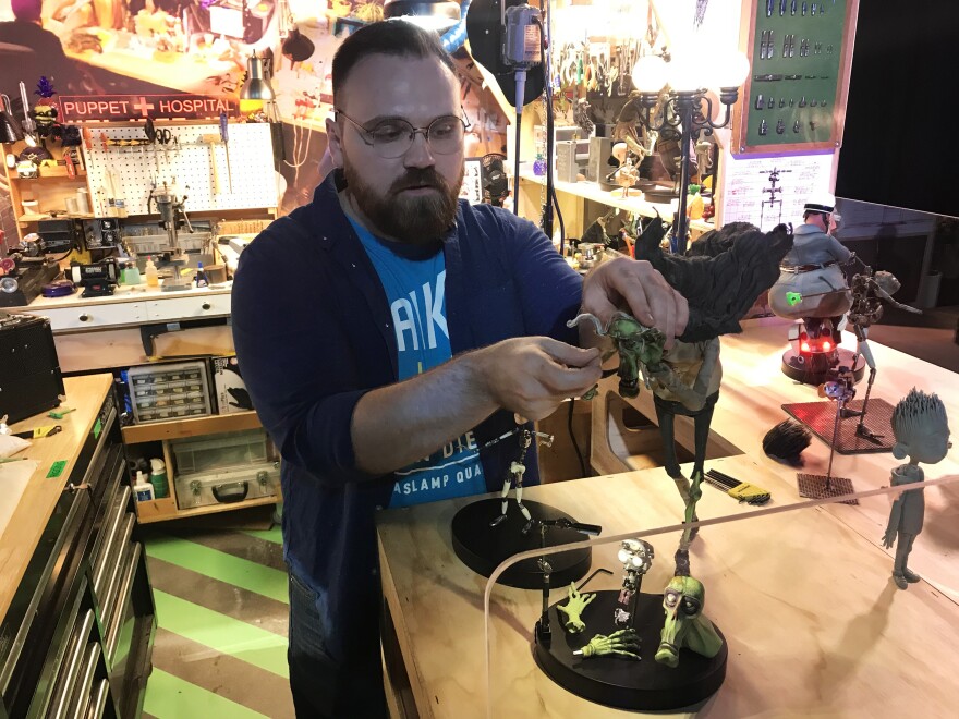 Austen Weitzel, 26, one of Laika's "puppet surgeons," he helps fix the puppets when they break during shooting, specializing in hair and fur. Weitzel started at Laika during <em>Kubo and the Two Strings'</em> production.