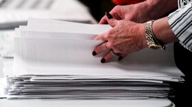 Election workers perform a recount of ballots from the recent primary election at the Montour County administration center in Danville, Pa., Friday, May 27, 2022.