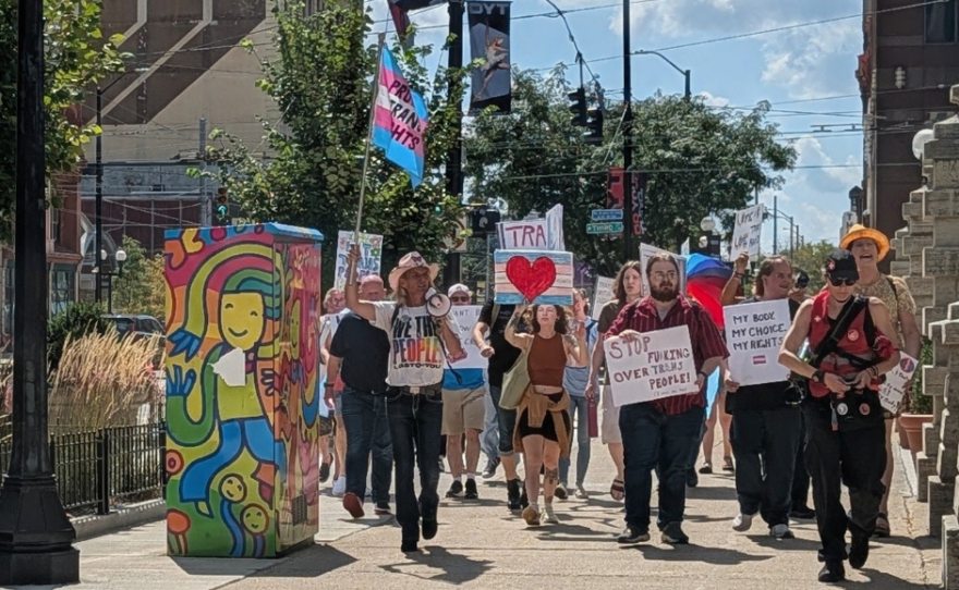 Demonstrators rally in downtown Dayton, calling for an end to anti-trans legislation in the Ohio Statehouse.