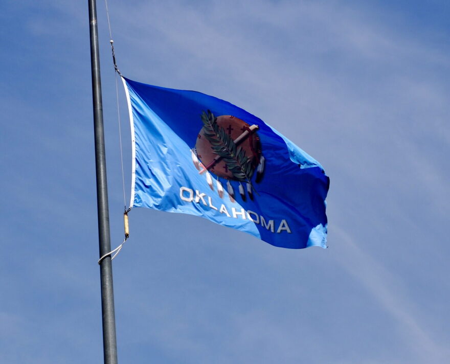 The Oklahoma state flag flies outside of the Oklahoma City Federal Building on June 24, 2025, in midtown Oklahoma City.