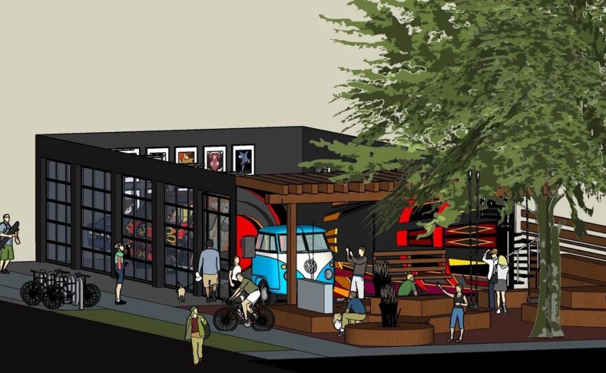 An artist's rendering of a garage with four vehicles parked inside, and an outdoor seating area covered by a pergola filled with people.
