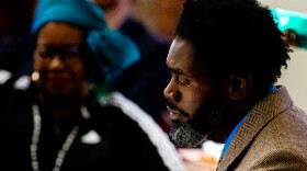 Alderman Brandon Bosley (Ward 3) weeps as he gives his farewell remarks on Monday, April 17, 2023, during the Board of Aldermen’s Sine Die at City Hall.