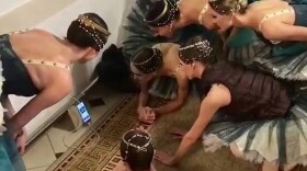 Bolshoi Ballet dancers check in on the Russia-Spain match backstage during a performance of "Raymonda." Credit: Bruna Gaglianone/Bolshoi Theatre