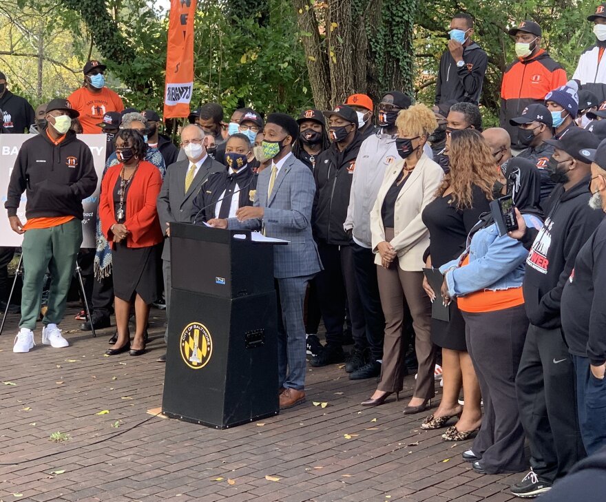 Mayor Brandon Scott speaks at a Tuesday news conference, where he announced that $50 million in American Rescue Plan Act funding will go toward violence prevention programming.