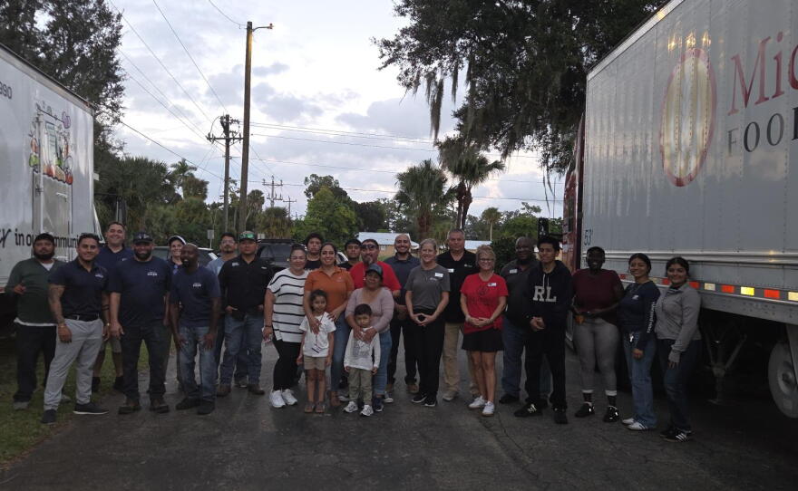 A evening food distribution in Immokalee recently let those who might not be able to attend a daytime event get access to needed food staples and supplies.