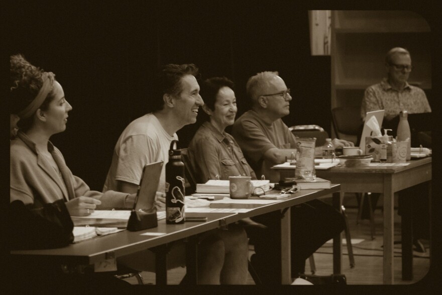 Josh Rhodes inside rehearsal room with for 'Knoxville' in Knoxville. To his right is award-winning songwriting duo Lynn Ahrens and Stephen Flaherty, who wrote the musical's score. 