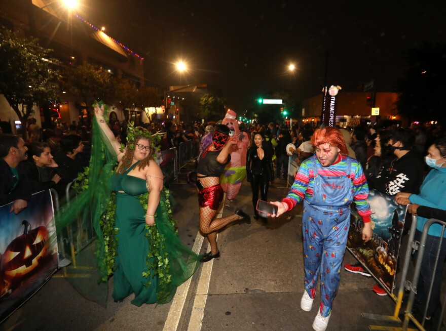 Community members enjoy the evening during the Dallas Halloween block party on Cedar Spring Rd. in Dallas on Oct 28, 2023.