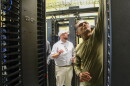 Fletch Batchelor (center) shows students around Louisiana Delta Community College's mock data center on Aug. 18, 2026.