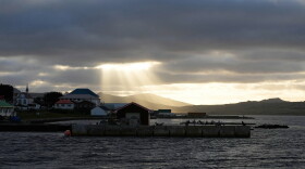 FILE - Sunlight breaks through the clouds over Stanley on the Falkland Islands, also known as Islas Malvinas, March 14, 2026. (AP Photo/Ricardo Mazalan, File)