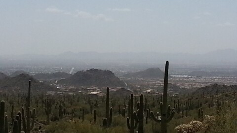 A hazy view of east Mesa and Gilbert from Usery Mountain