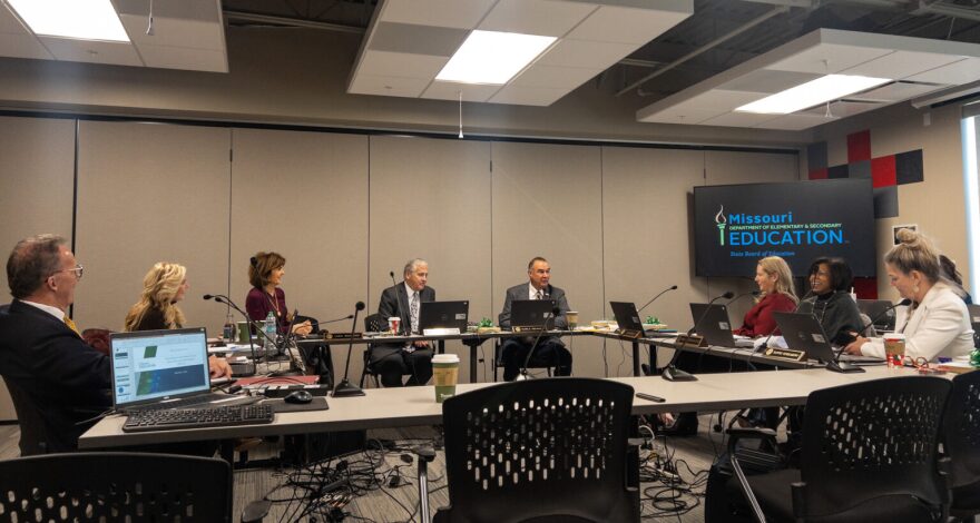 Gov. Mike Kehoe talks with the State Board of Education meeting during its December 2024 meeting before officially taking office in January 2025.
