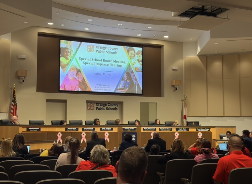Orange County Public Schools board members met to discuss a contract impasse with two employee unions over proposed health insurance changes. The board voted to postpone the hearing until Nov. 13.