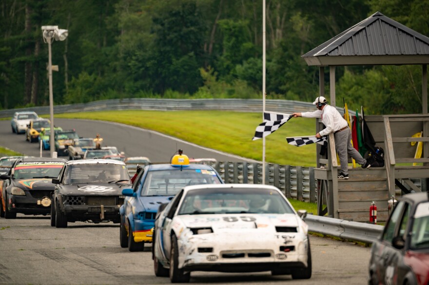 A checkered flag waved in the motley parade just as it would at any other race at the Thompson Speedway Motorsports Park.