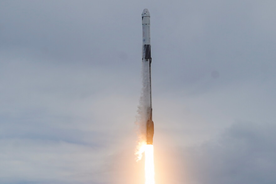A SpaceX Falcon 9 rocket with a crew of four launches from pad 40 at the Cape Canaveral Space Force Station in Cape Canaveral, Fla., Thursday, Oct. 1, 2026.